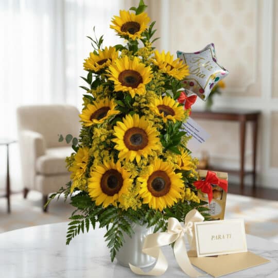 Arreglo floral "Arreglo con Girasoles Halo" sobre una mesa de mármol, con girasoles vibrantes, follaje verde, un globo de "Fe